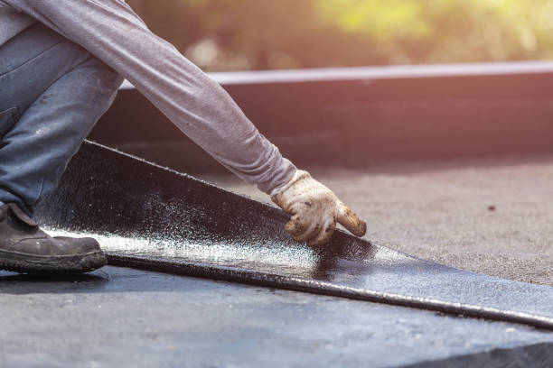 Professional Waterproofing technician working in Williamstown, OH